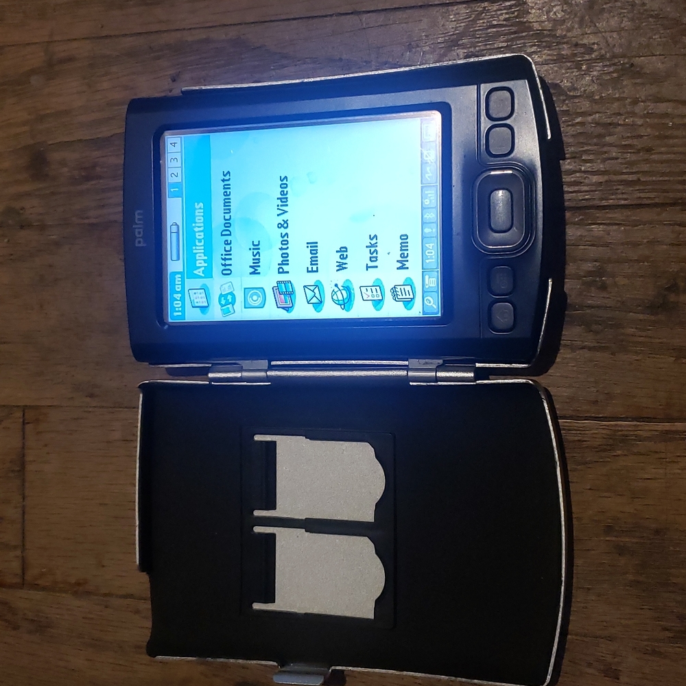 Antique Palm TX with aluminum hard case, instruction booklet, and more!